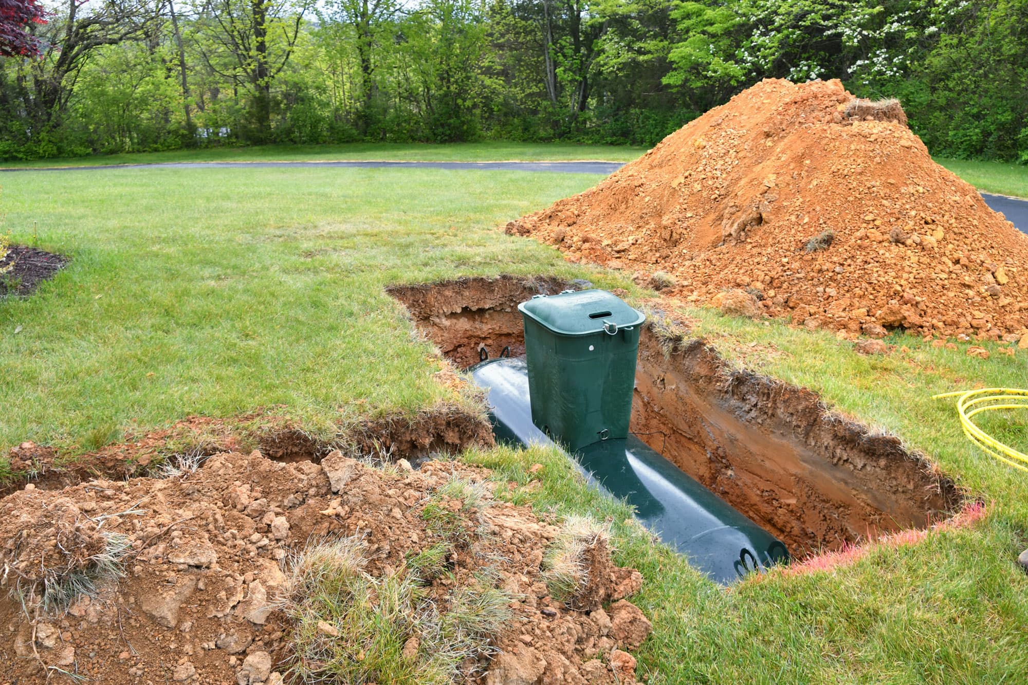 Septic tank being installed in ground